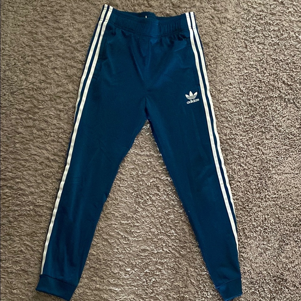 adidas Blue Sweatpants with Tapered Fit and Signature Stripes